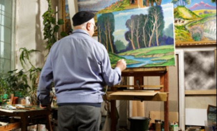 artist standing at easel